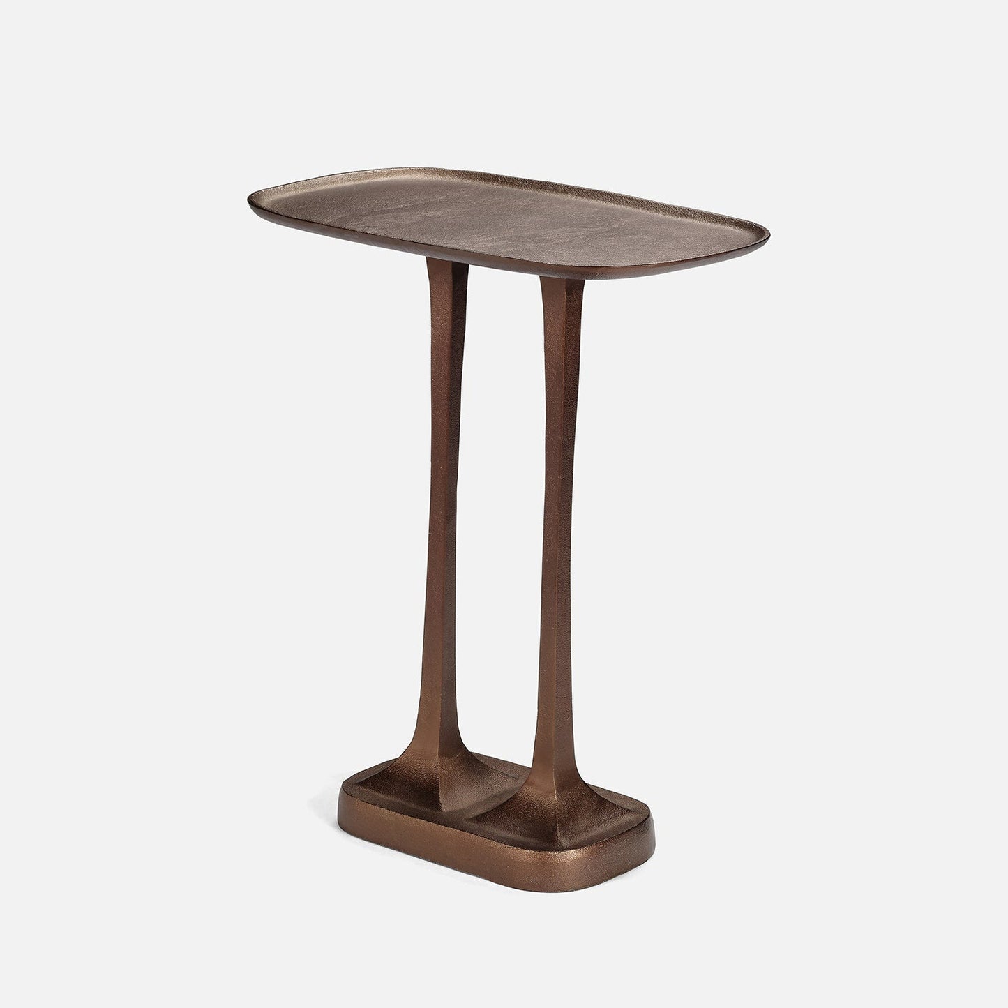 Bronze side table on a white background