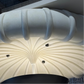 Close-up of decorative ceiling fixtures with a ribbed design.