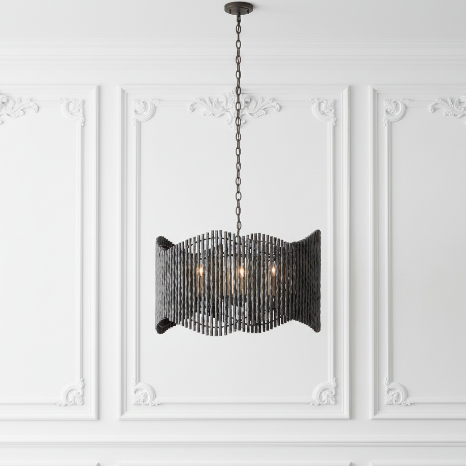 Decorative chandelier hanging against a white paneled wall