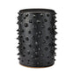 Black textured side table on a white background