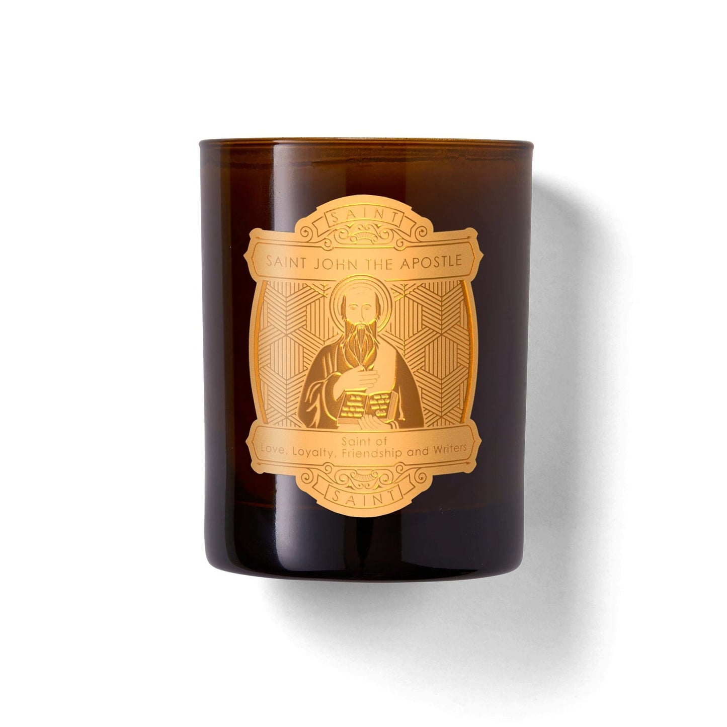 Brown candle with gold emblem featuring a religious figure on a white background