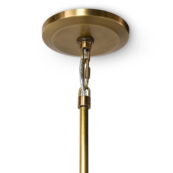 Brass ceiling light fixture on a white background
