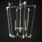 Decorative chandelier with metallic frame on a black background