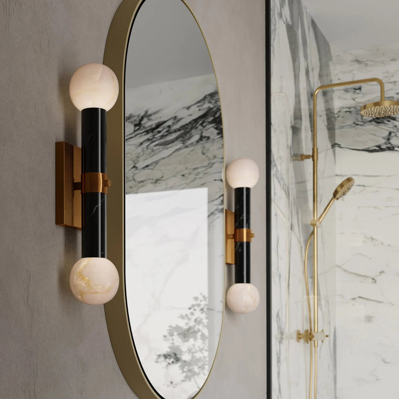 Round mirror with spherical sconces on a marble wall