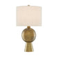 Table lamp with a gold base and white shade on a white background