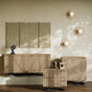 Wooden furniture pieces in a room with light-colored walls and decorative lights.