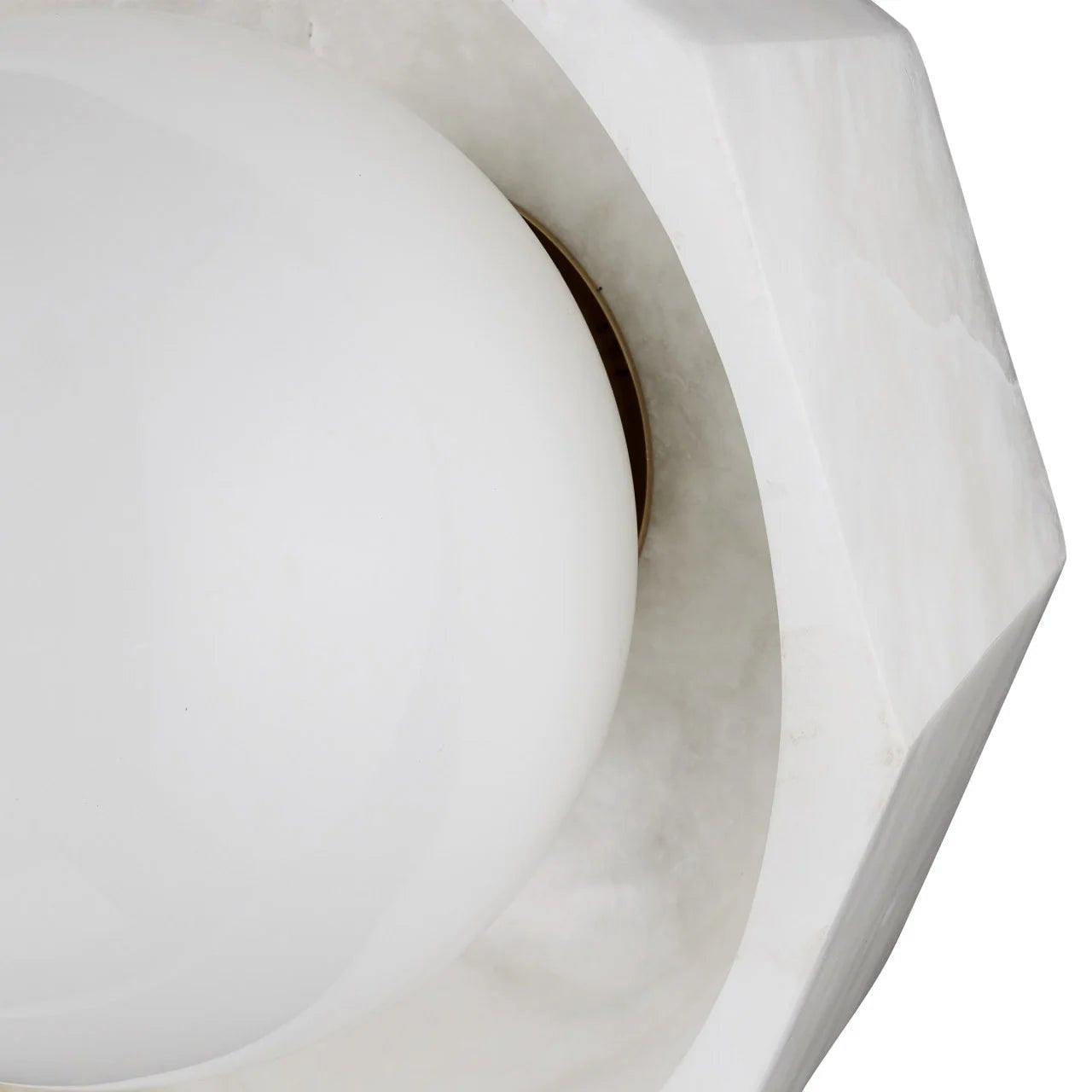 Close-up of a white ceramic vase with geometric design on a white background