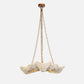 Decorative pendant light with wavy design and gold chain on a white background