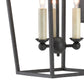 Decorative candle-style light fixture with three lit candles on a white background