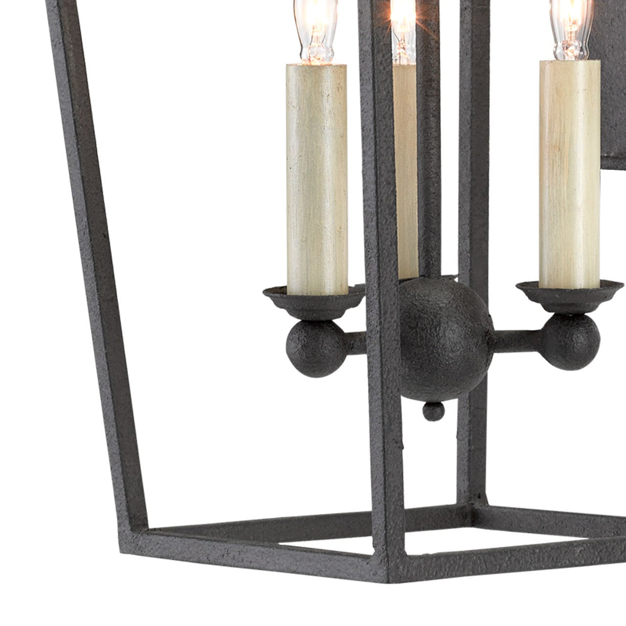 Decorative candle-style light fixture with three lit candles on a white background