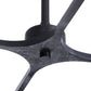 Close-up of a dark metal chair base on a white background