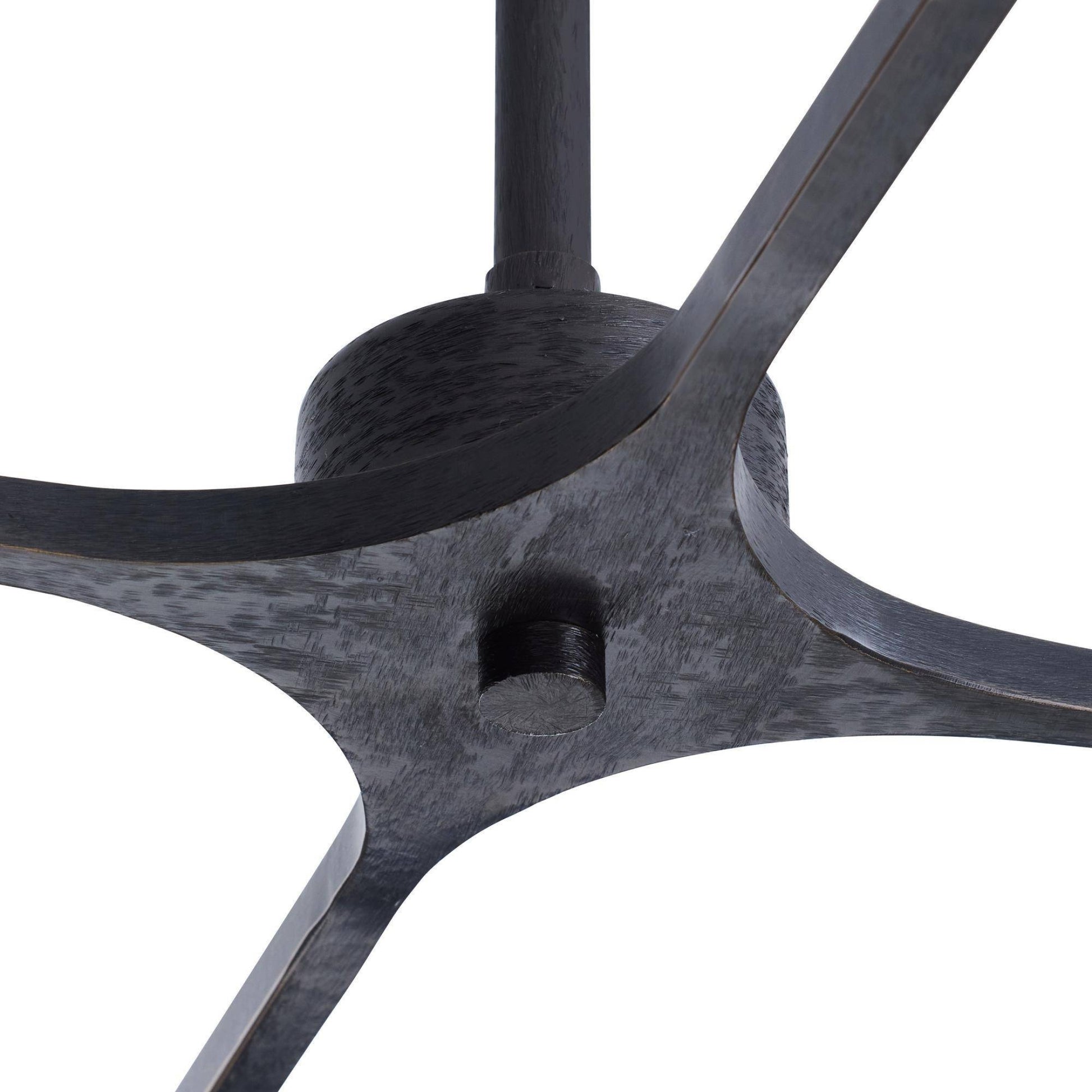 Close-up of a dark metal chair base on a white background