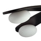 Modern ceiling light fixture with black frame and white glass shades on a white background