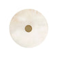 Round beige object with a central hole on a white background