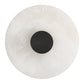 Round white object with a black center on a white background