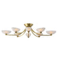 Gold chandelier with white glass shades on a white background