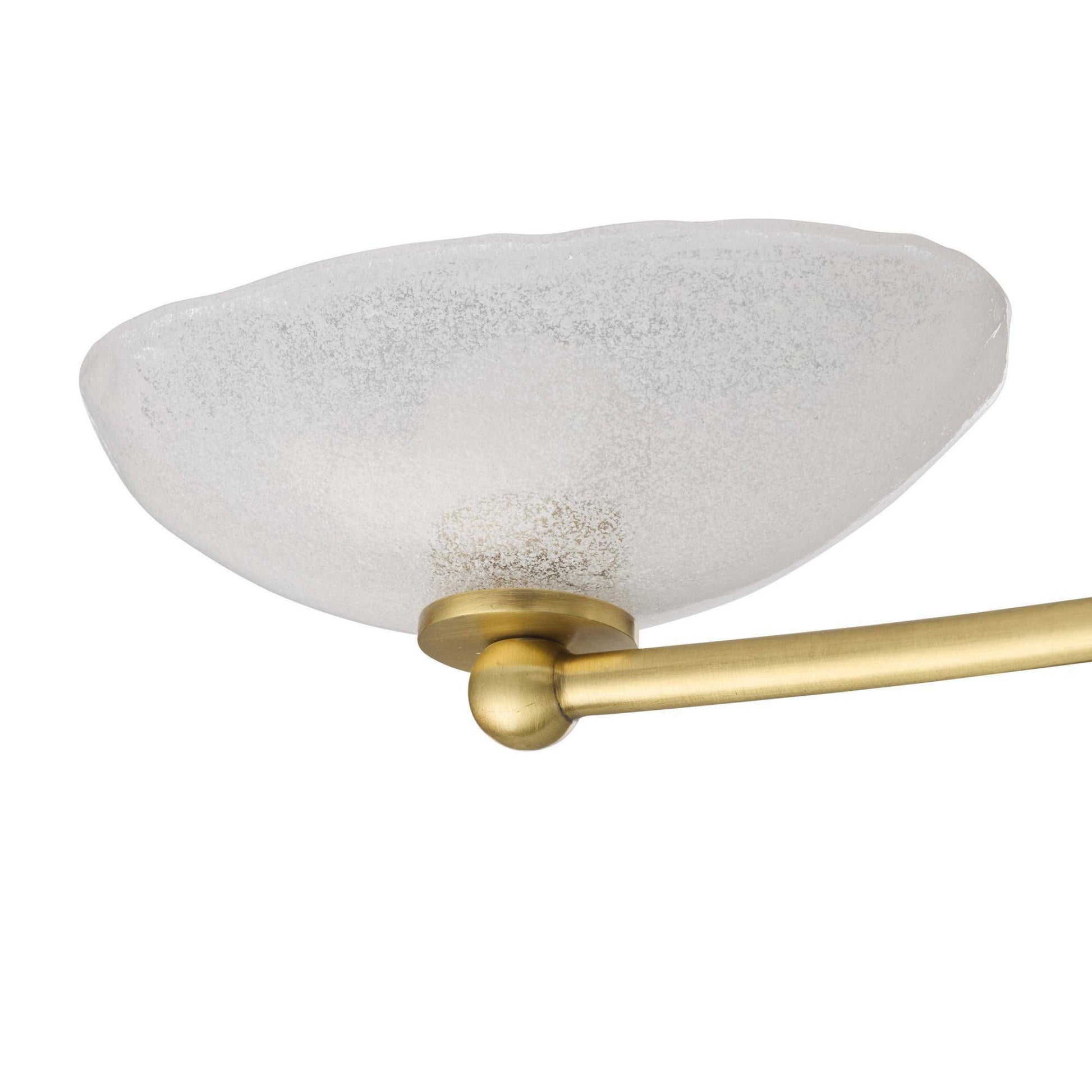 Ceiling light fixture with textured white shade and gold arm on a white background