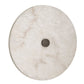 Round marble object with a central metallic disc on a white background