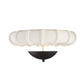 Wall-mounted light fixture with white cloud-like shade and black base on a white background
