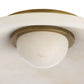 Ceiling light fixture with brass finish and white glass shade on a white background
