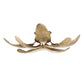 gold flush mount with leaf-like designs on a white background
