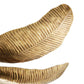 Decorative leaf-shaped flush with a textured surface on a white background