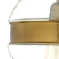 Close-up of a gold and clear pendant light fixture on a white background