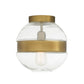 A modern spherical pendant light fixture with a clear glass globe shade and brushed brass metal bands, featuring a visible filament light bulb inside.