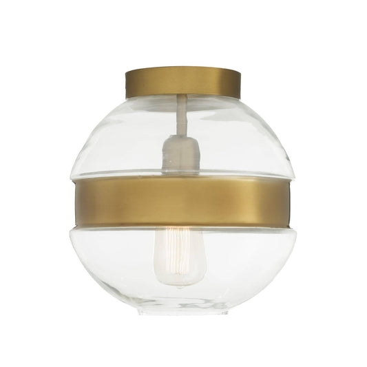 A modern spherical pendant light fixture with a clear glass globe shade and brushed brass metal bands, featuring a visible filament light bulb inside.