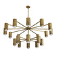 Gold chandelier with multiple cylindrical lampshades on a white background