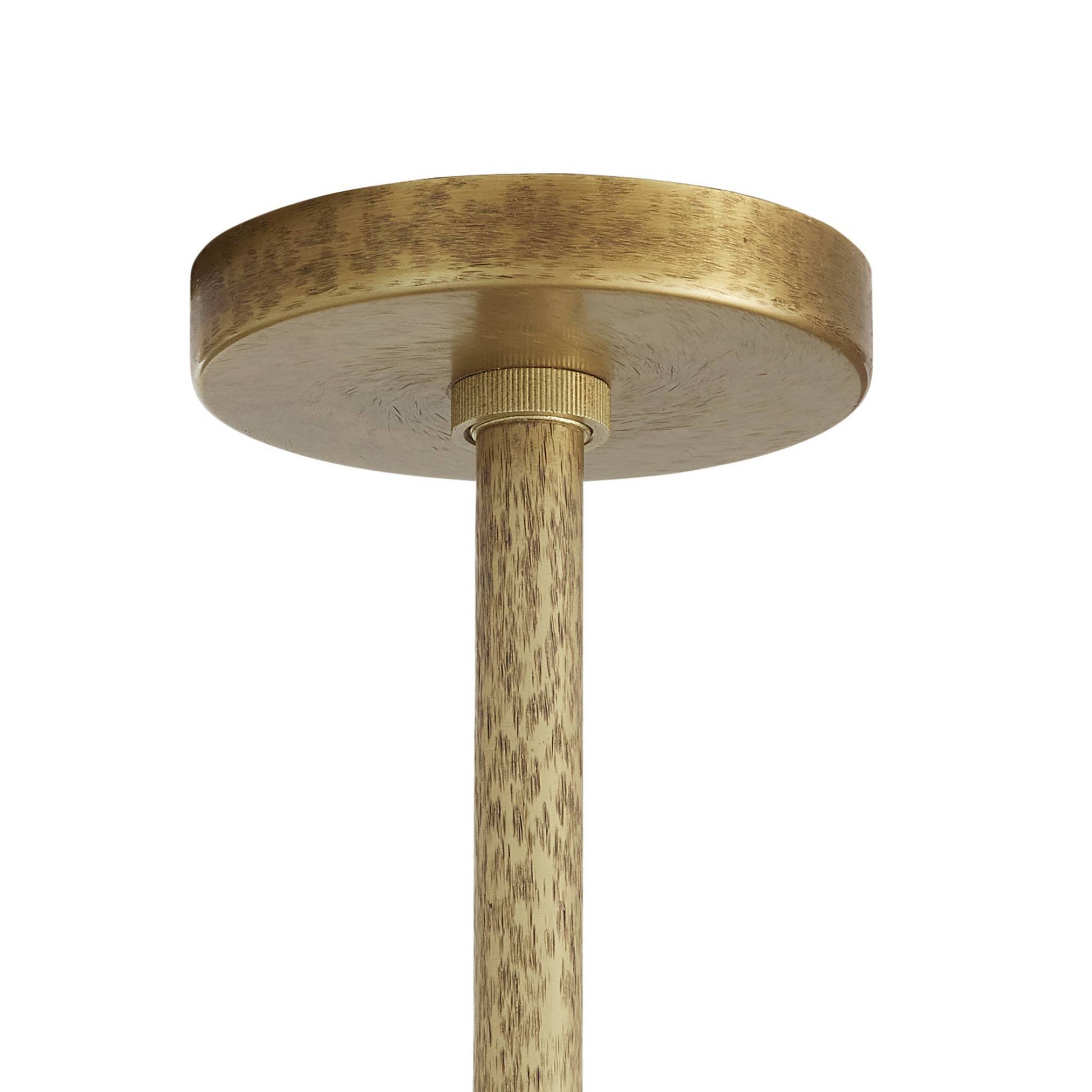 Brass ceiling light fixture on a white background