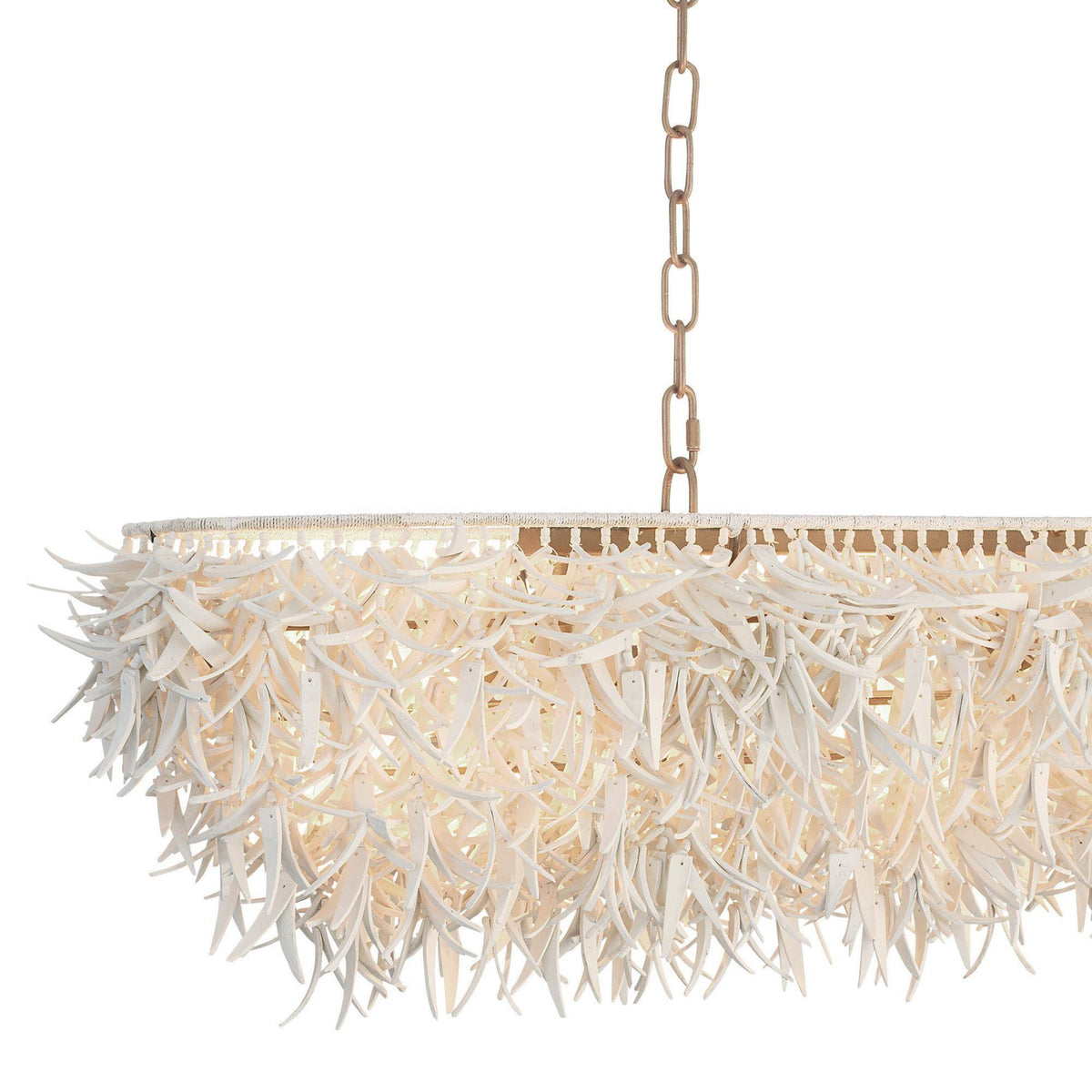 A modern drum chandelier with a dense, layered texture of off-white branches or antlers, suspended by a gold-toned metal chain against a solid white background.