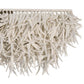 Decorative table with a unique white branch-like design on a white background