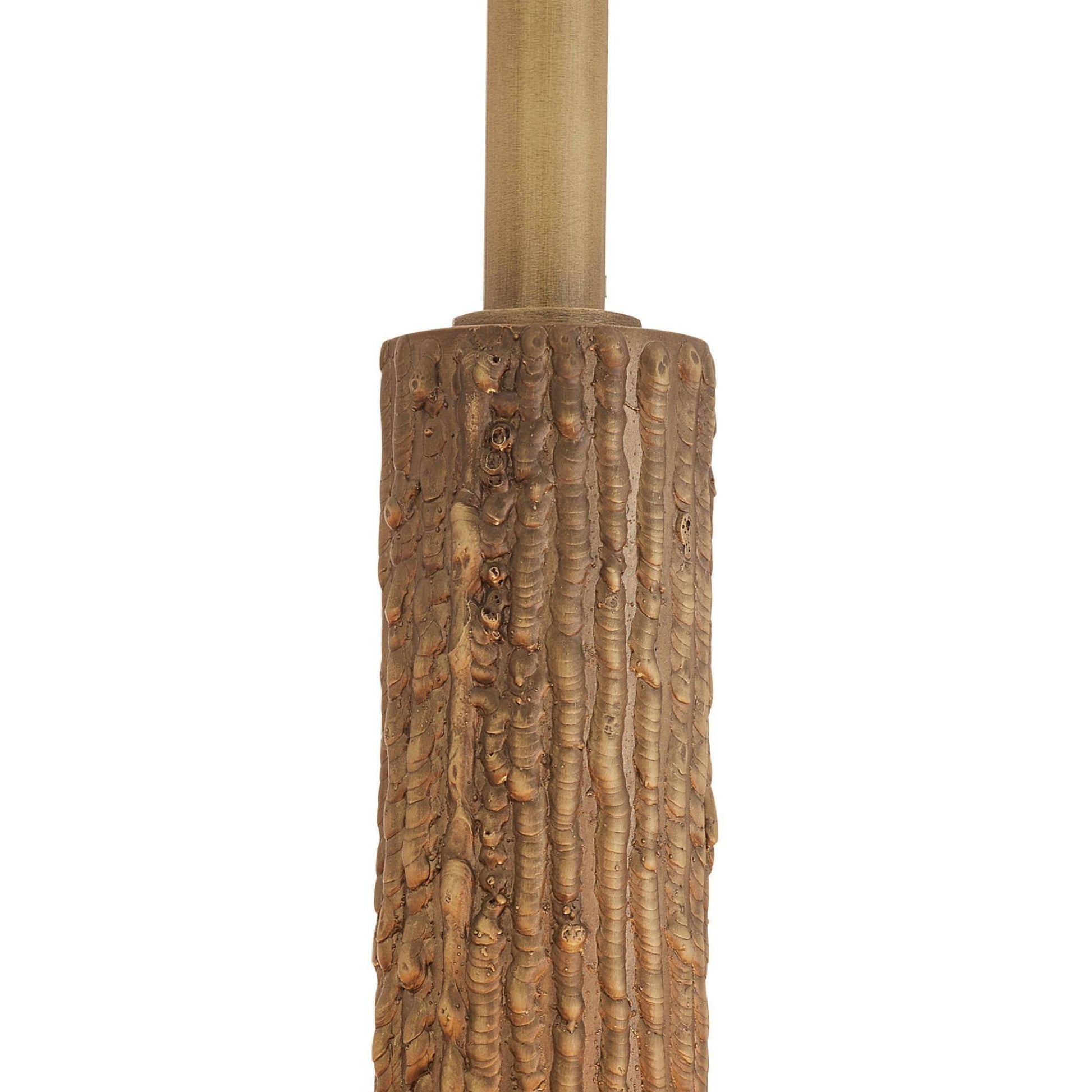 Close-up of a textured wooden post on a white background