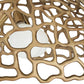 Decorative brass light fixture with intricate design on a white background