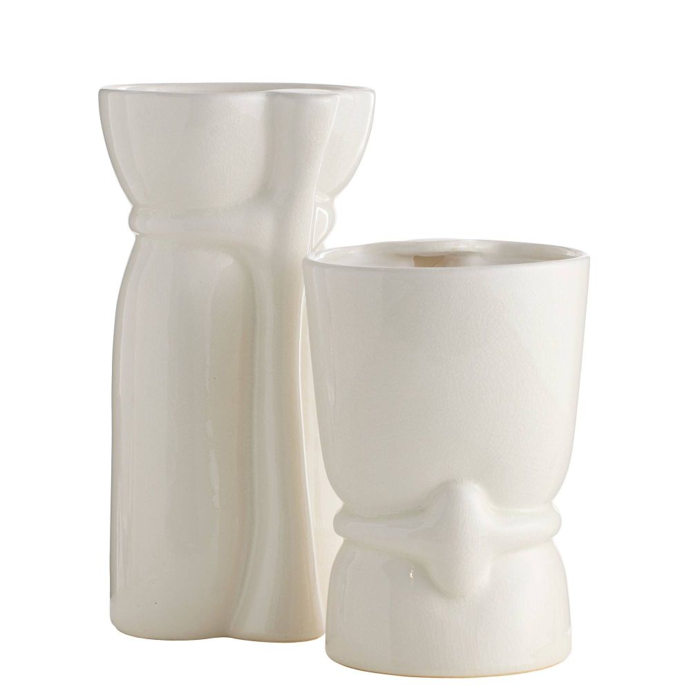 Two white ceramic tiki mugs on a white background