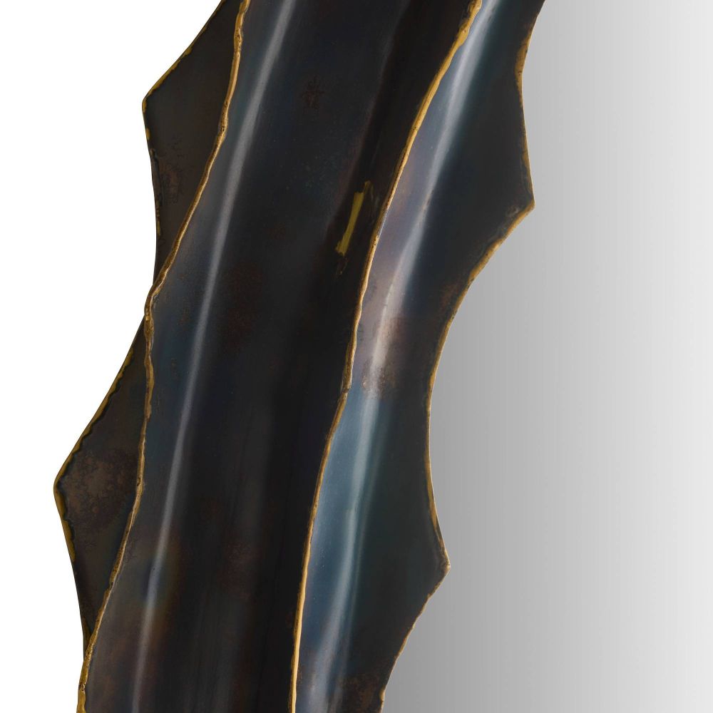 Close-up of a dark, textured object on a light gray background