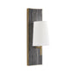 Wall sconce with textured black panel and white shade on a white background