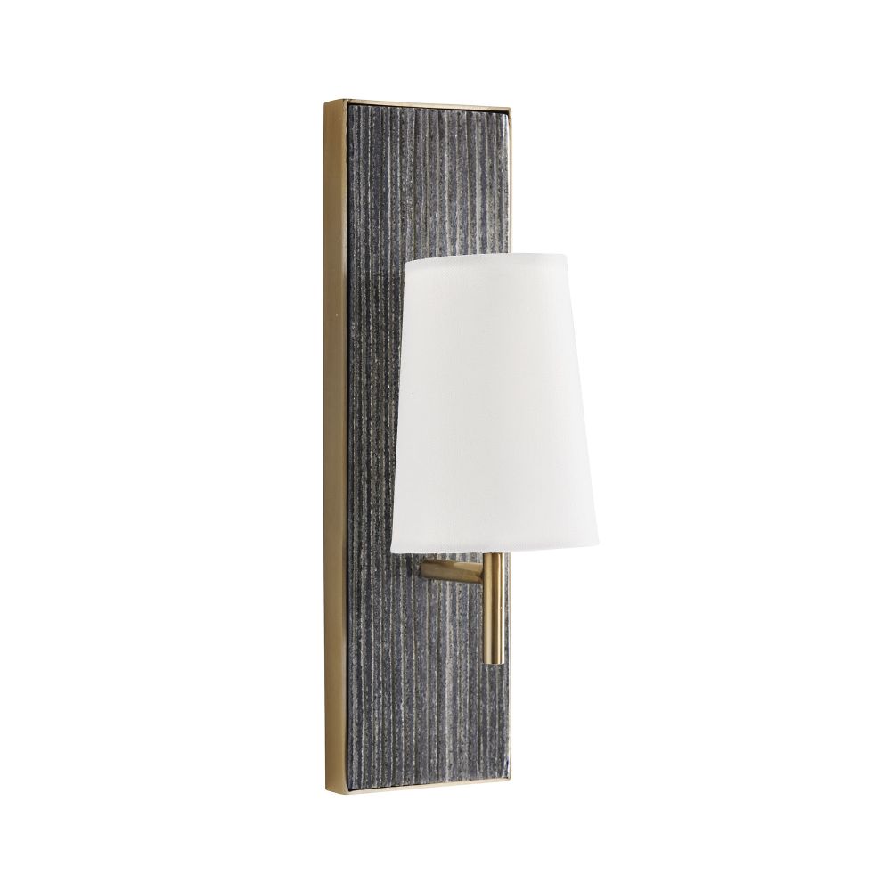 Wall sconce with textured black panel and white shade on a white background
