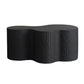 Black textured side table on a white background