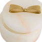 Decorative item with a gold bow on a white background