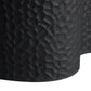Close-up of a textured black surface with a diamond pattern