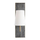 Decorative wall sconce with a textured black frame and white shade on a white background