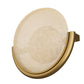 Wall sconce with a gold frame and white glass on a white background