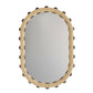 Round mirror with a beige frame and black decorative elements on a white background