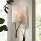 Wall-mounted light fixture with textured glass shade and rope detail on a white wall.