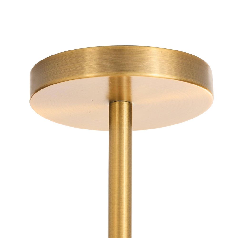 Gold pendant light fixture on a white background