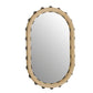 Round mirror with a beige frame and black accents on a white background