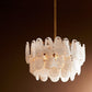 Chandelier with white glass shades on a dark background