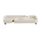 White ceramic tray with gold accents on a white background